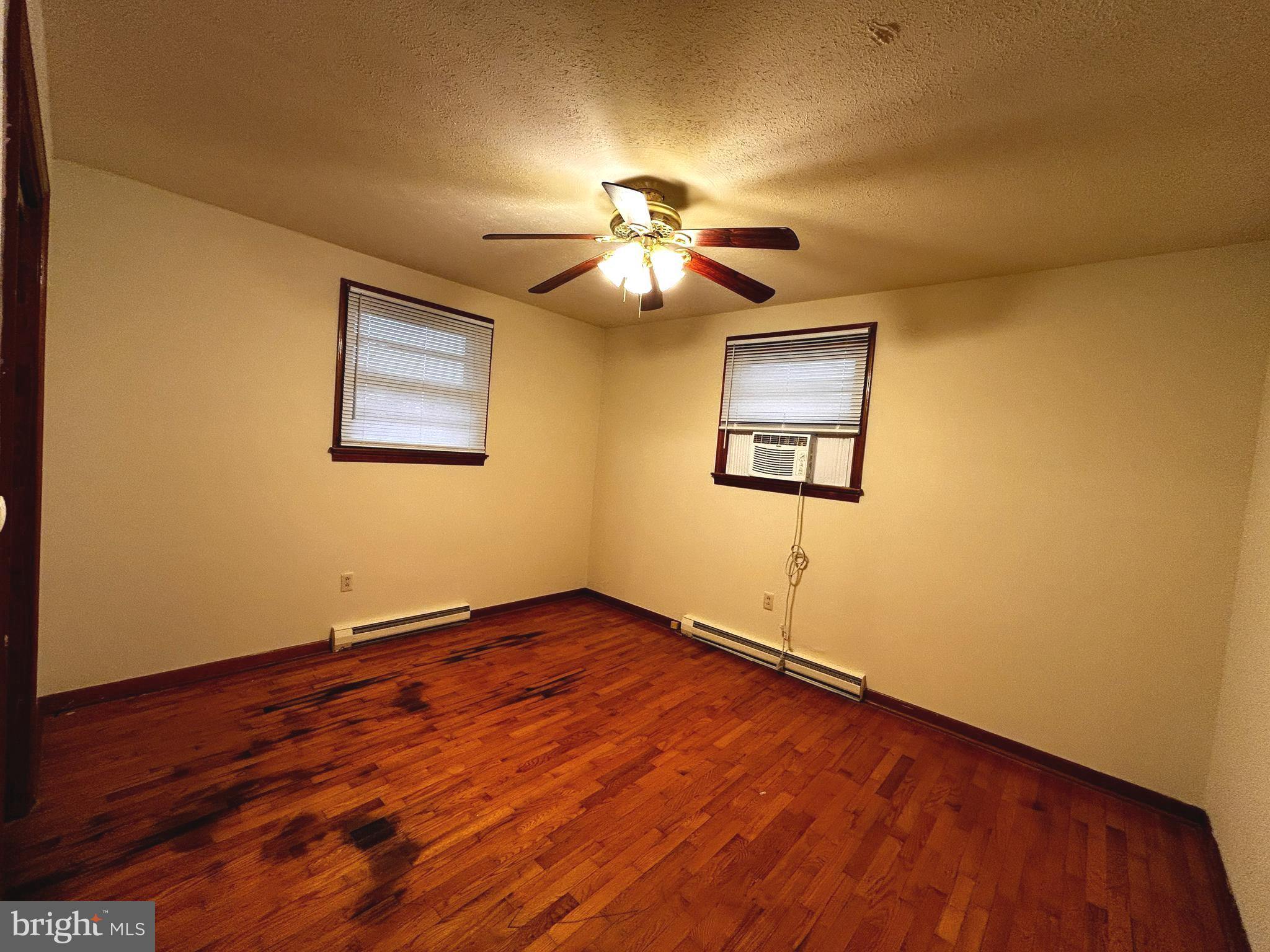 760 Jordan Springs Road Stephenson, VA 22656 - Photo 15 of 27 a view of a room with wooden floor