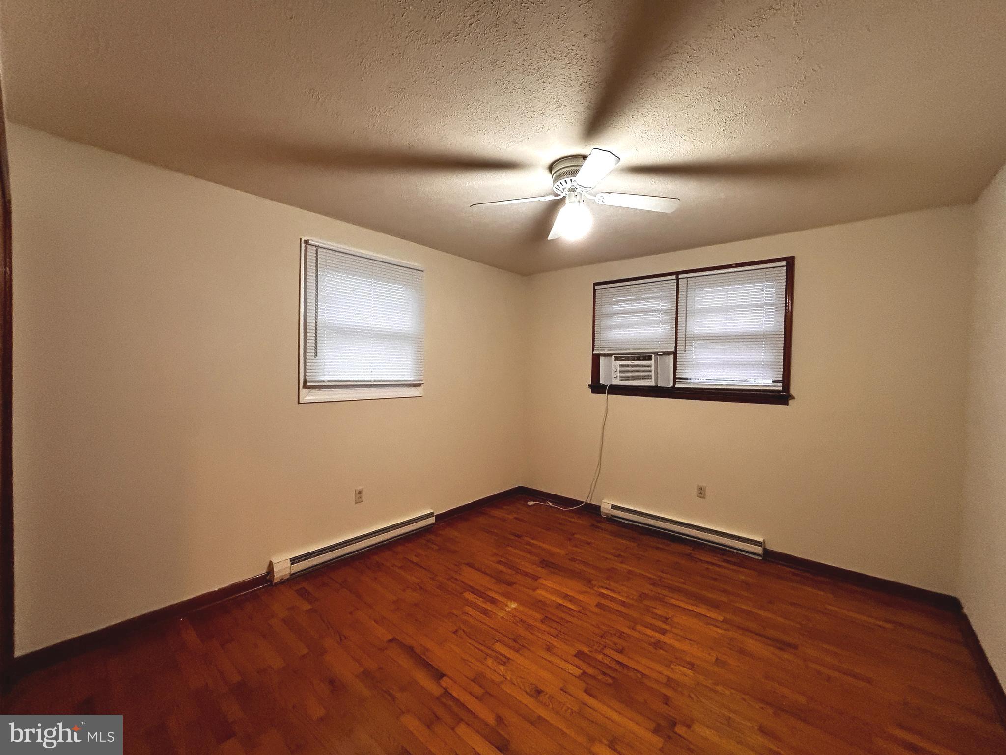 760 Jordan Springs Road Stephenson, VA 22656 - Photo 18 of 27 a view of empty room with wooden floor