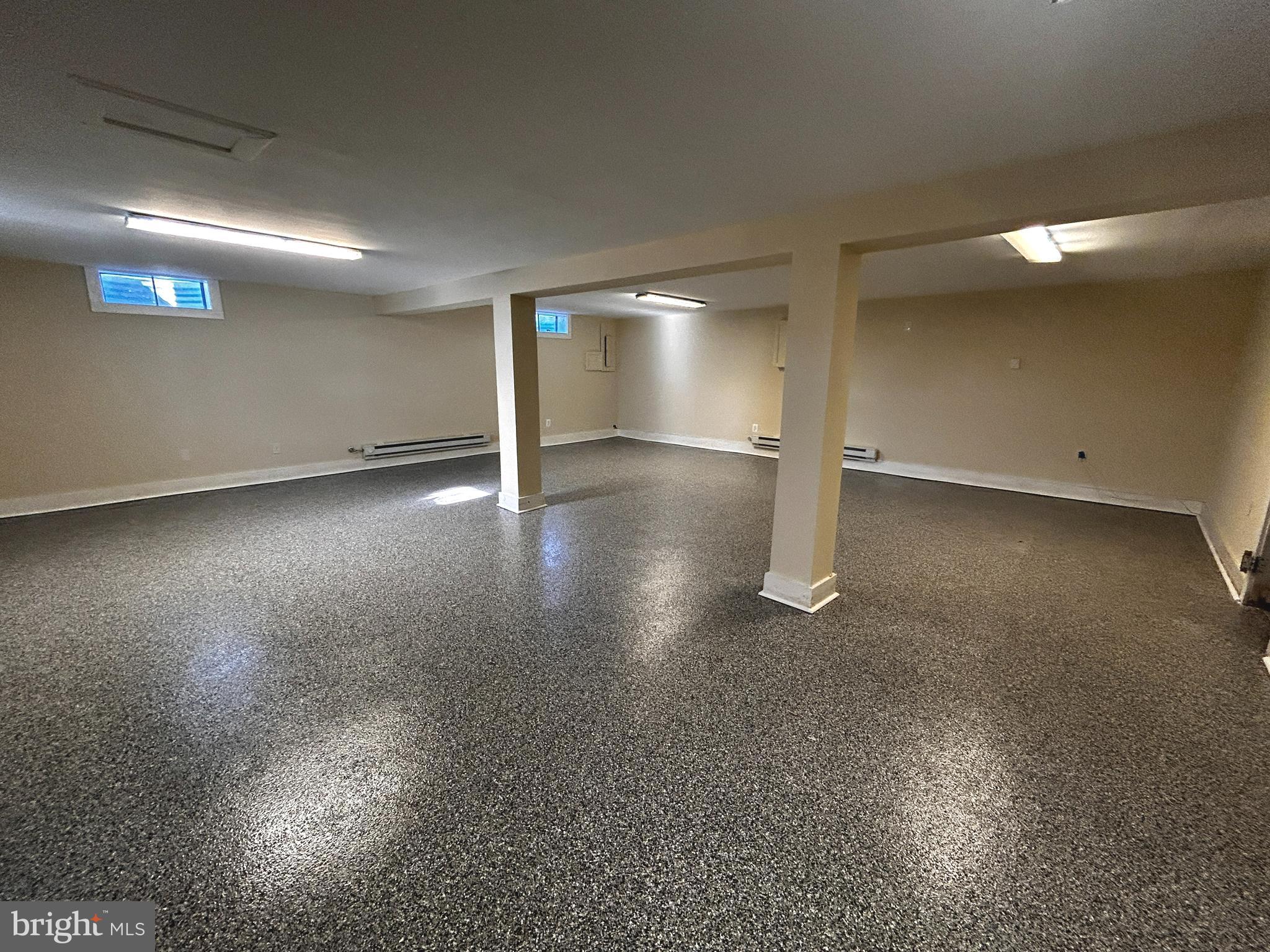 760 Jordan Springs Road Stephenson, VA 22656 - Photo 21 of 27 an empty room with a empty space and windows