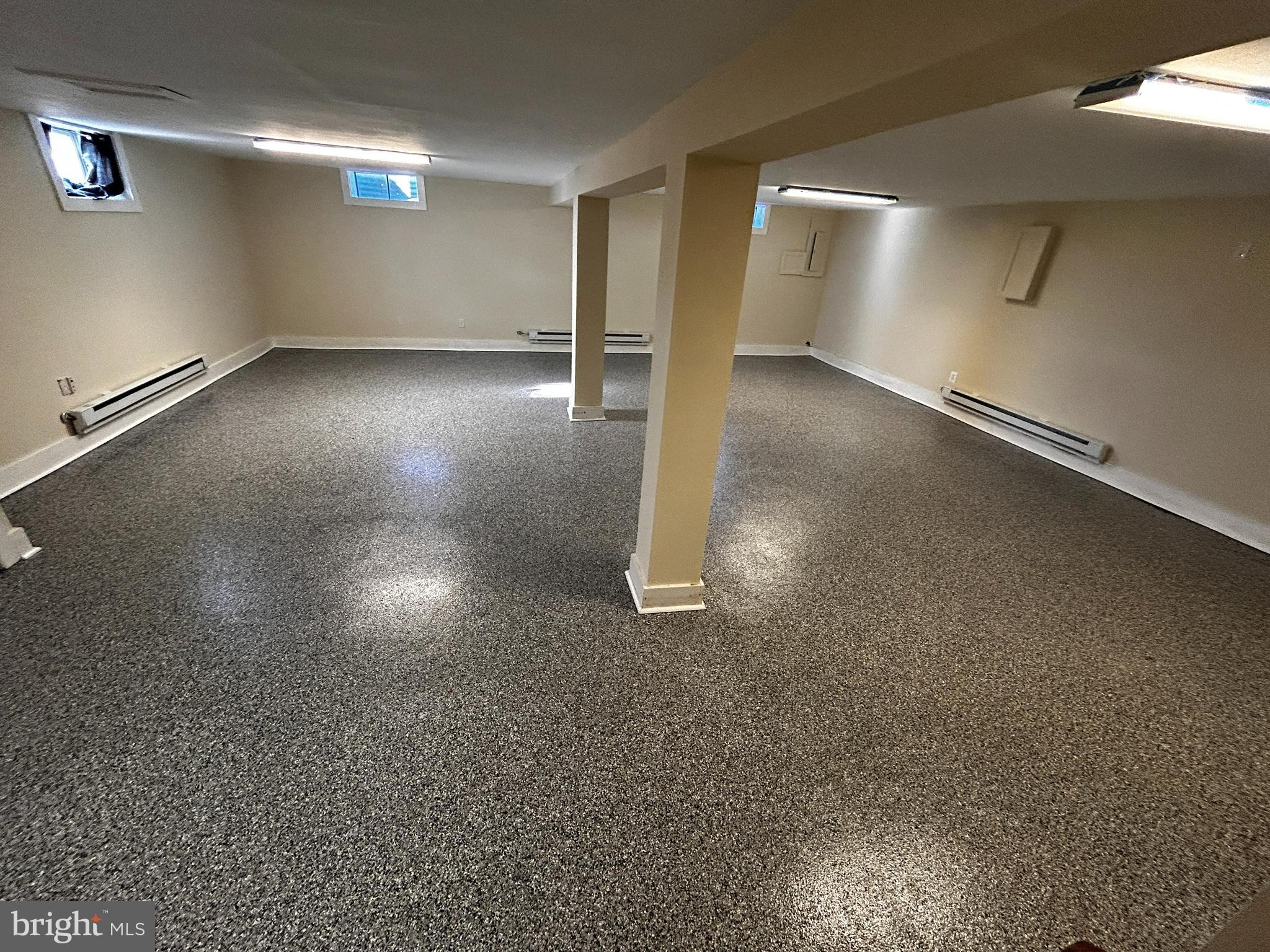 760 Jordan Springs Road Stephenson, VA 22656 - Photo 23 of 27 an empty room with a empty space and windows