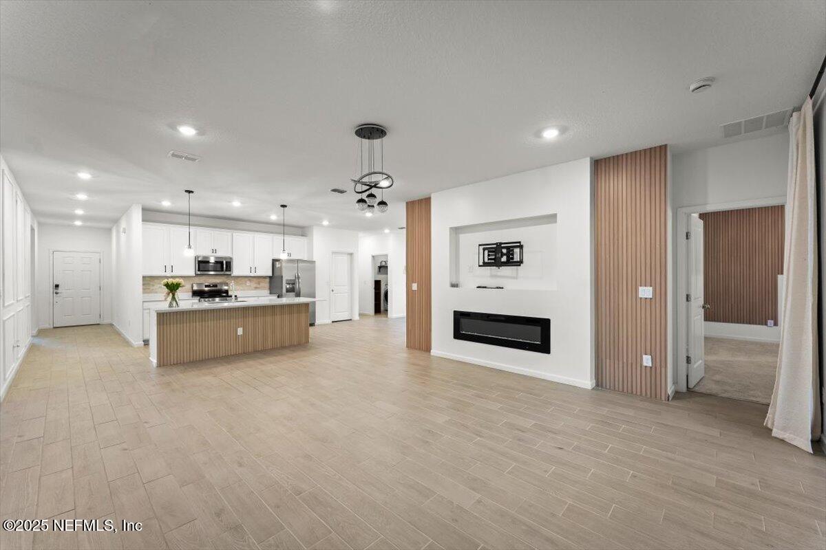 1598 Lachlan Circle Jacksonville, FL 32218 - Photo 11 of 38 a view of a kitchen with a sink and a stove top oven
