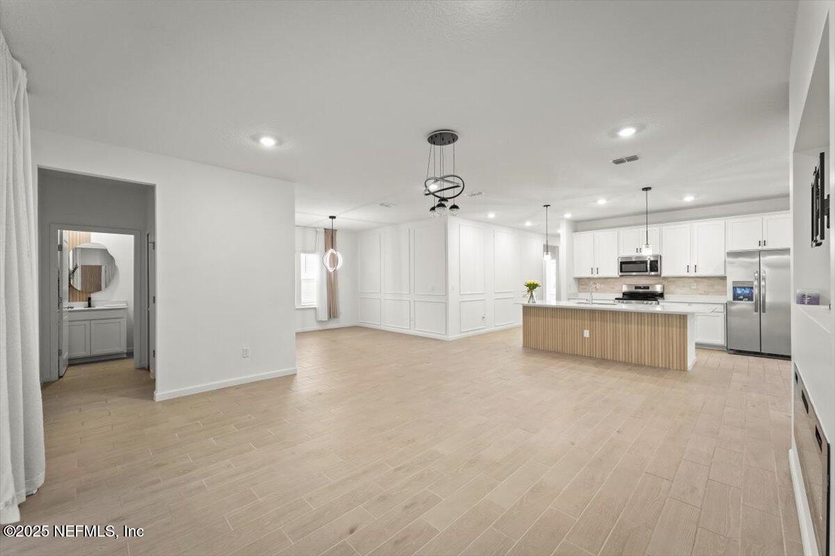 1598 Lachlan Circle Jacksonville, FL 32218 - Photo 12 of 38 a view of kitchen with kitchen island and stainless steel appliances