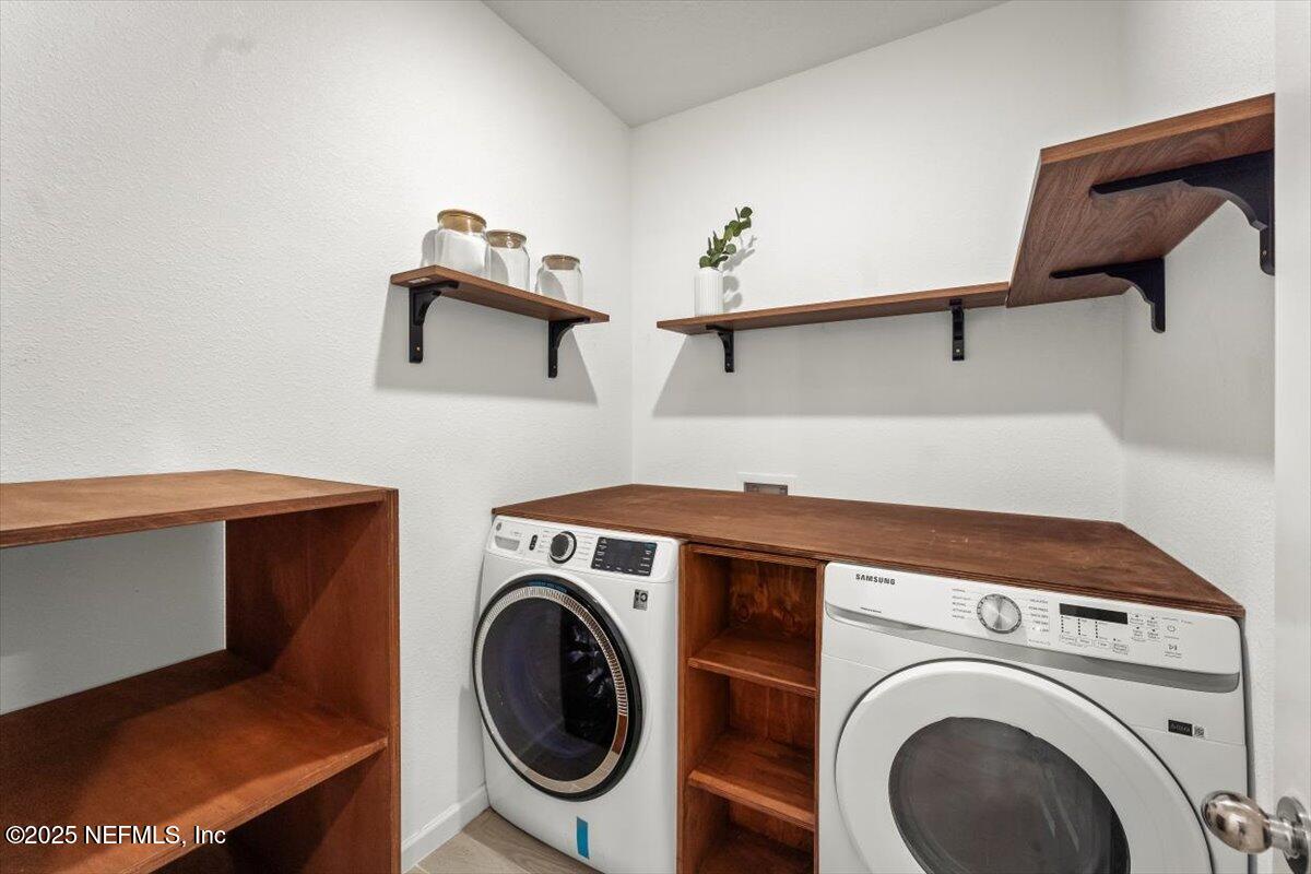 1598 Lachlan Circle Jacksonville, FL 32218 - Photo 16 of 38 a utility room with dryer and washer