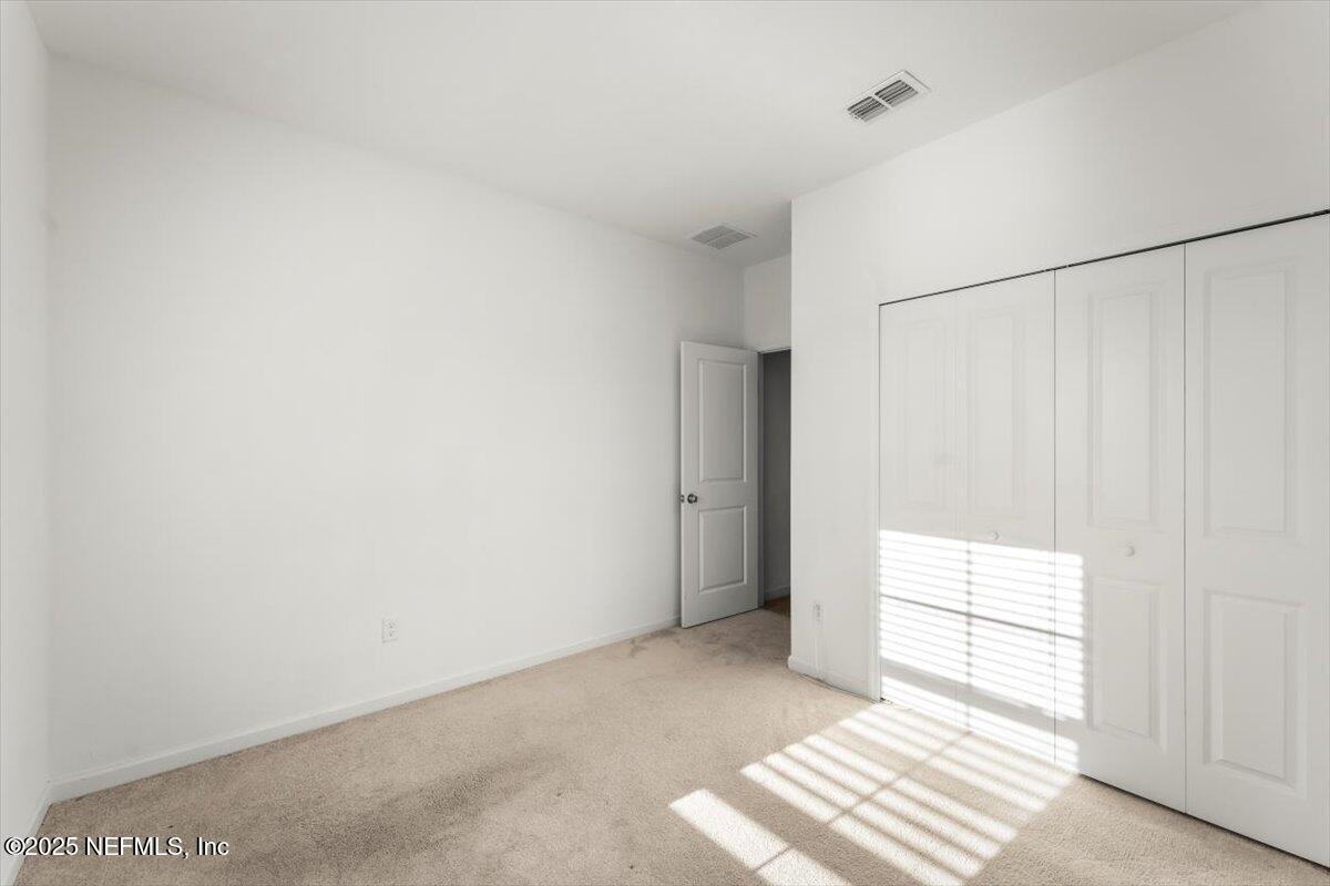 1598 Lachlan Circle Jacksonville, FL 32218 - Photo 18 of 38 a view of an empty room
