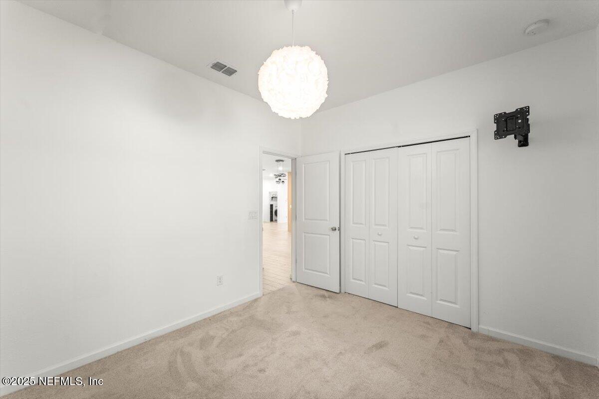 1598 Lachlan Circle Jacksonville, FL 32218 - Photo 20 of 38 wooden floor in an empty room