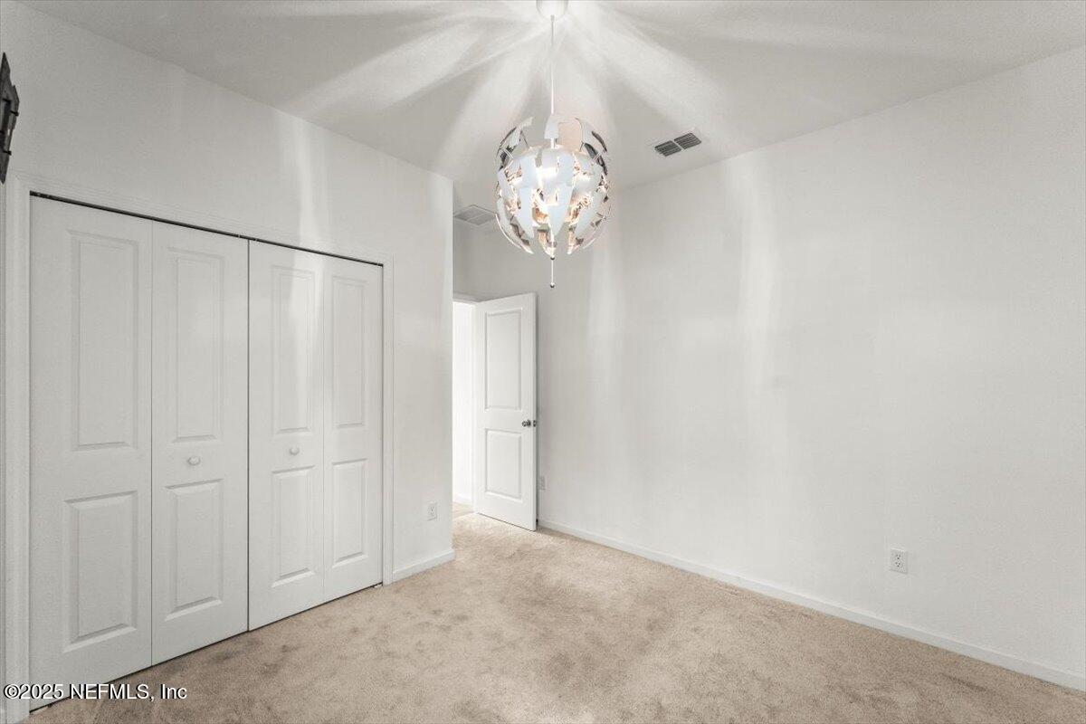 1598 Lachlan Circle Jacksonville, FL 32218 - Photo 22 of 38 a view of a chandelier in big room