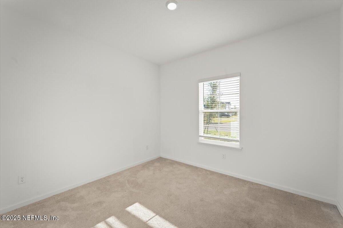 1598 Lachlan Circle Jacksonville, FL 32218 - Photo 33 of 38 an empty room with a window
