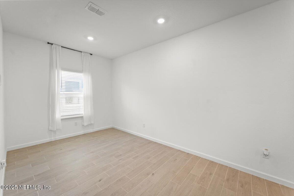 1598 Lachlan Circle Jacksonville, FL 32218 - Photo 8 of 38 an empty room with a empty space and window