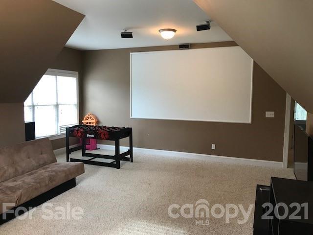 1912 Riverbank Road Waxhaw, NC 28173 - Photo 16 of 19 a living room with furniture and a window