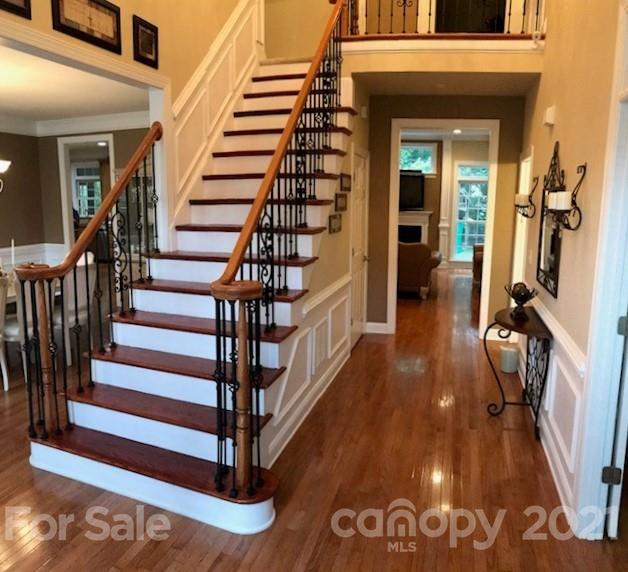 1912 Riverbank Road Waxhaw, NC 28173 - Photo 4 of 19 a view of entryway and hall with wooden floor