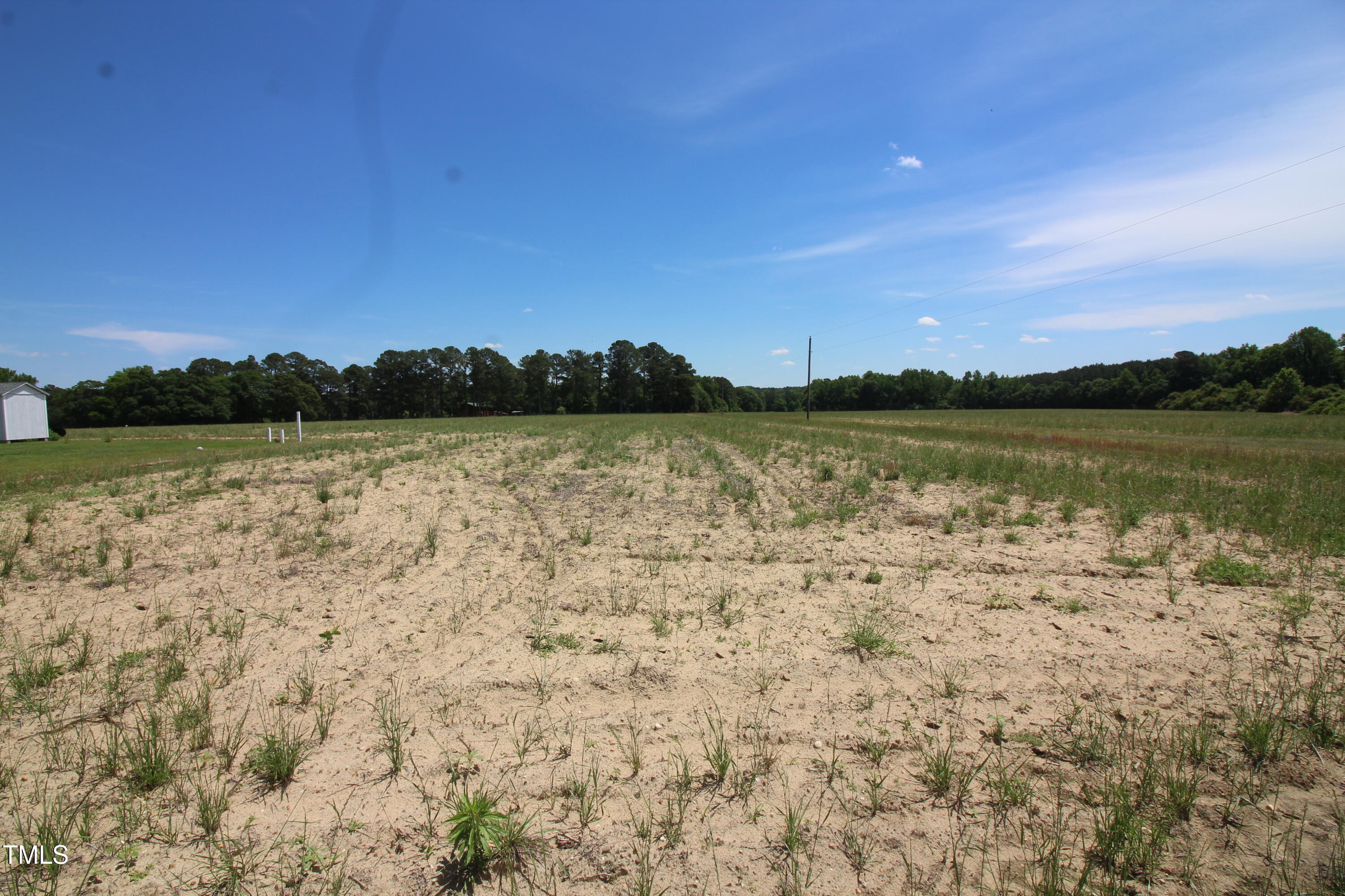 0 John Lee Road Dunn, NC 28334 - Photo 3 of 12 a view of lake with mountain