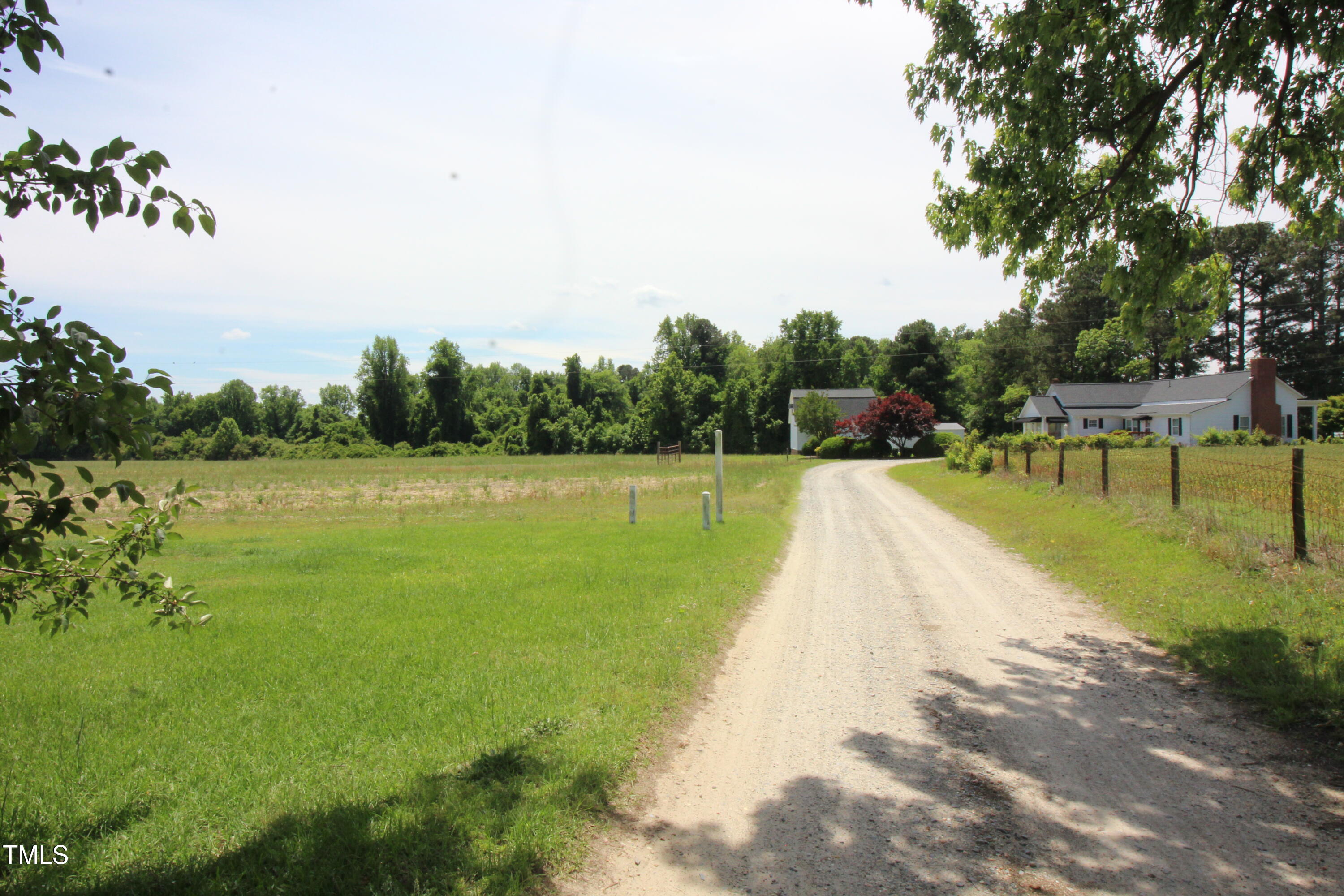 0 John Lee Road Dunn, NC 28334 - Photo 10 of 12 a view of a swimming pool with a yard