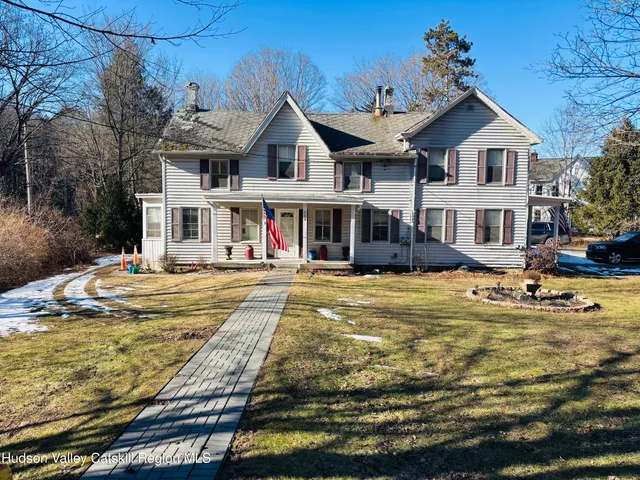 a front view of a house with swimming pool