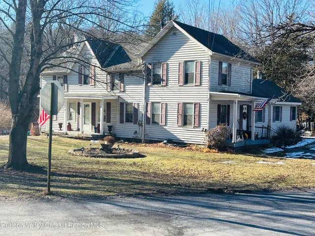 a view of a backyard of the house