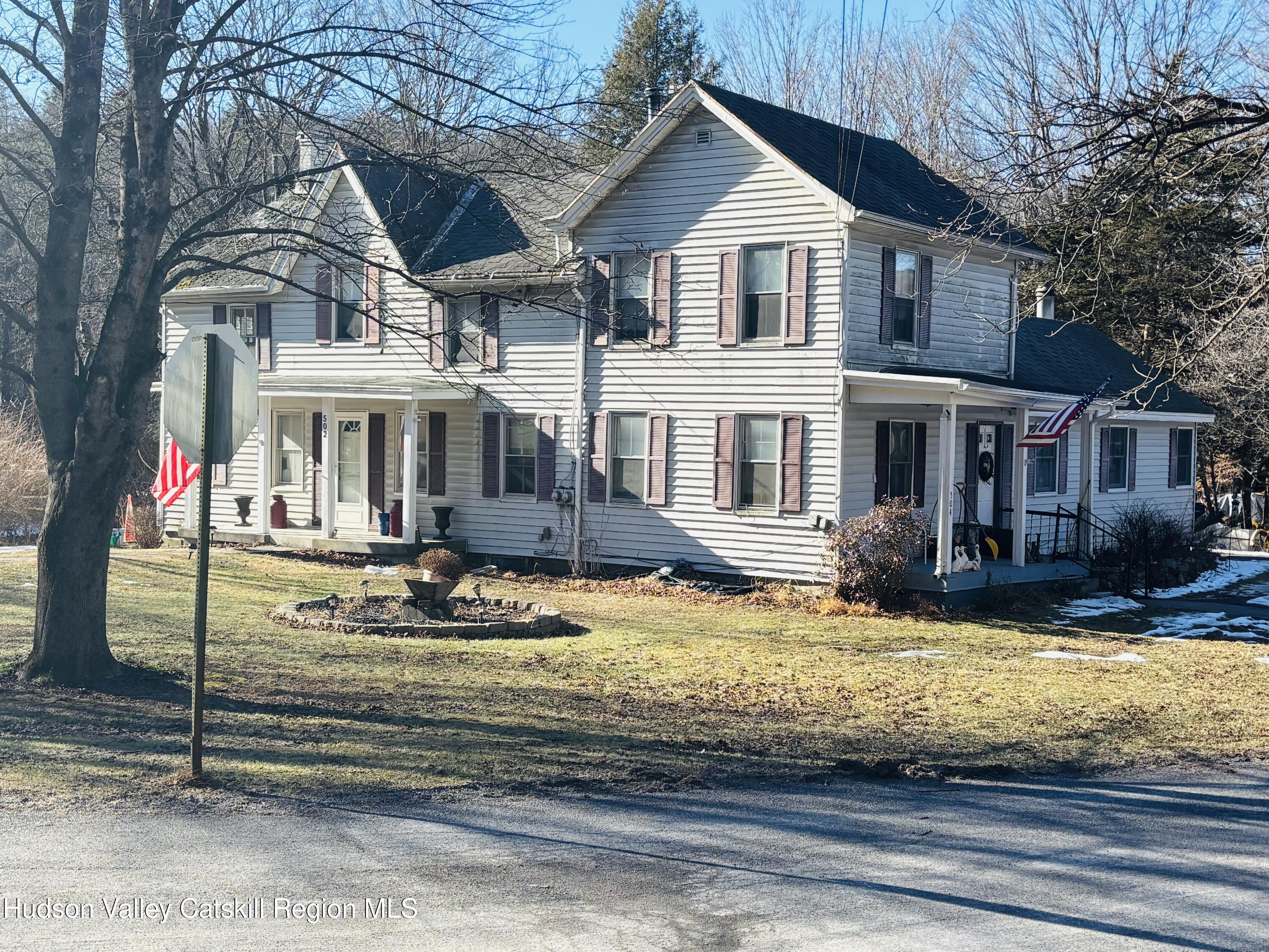 502-504 Greenkill Road Kingston, NY 12401 - Photo 2 of 5 a front view of a house with swimming pool