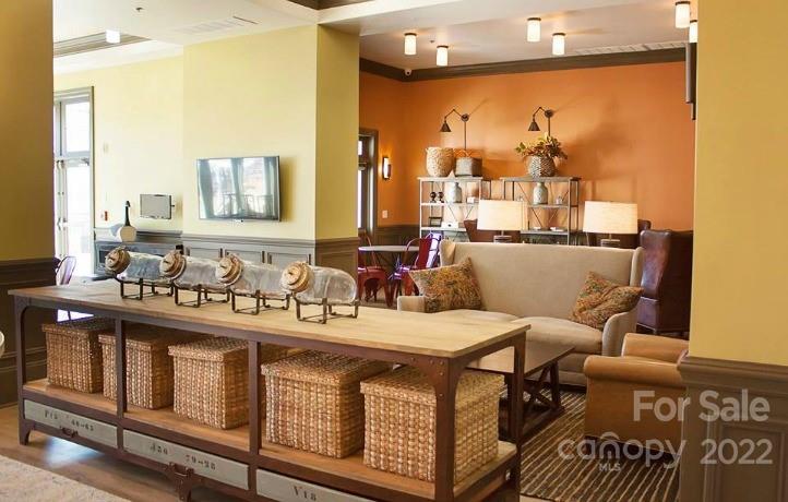 4043 Oakmere Road, Unit 953 Waxhaw, NC 28173 - Photo 13 of 21 a bathroom with a sink mirror and a bath tub