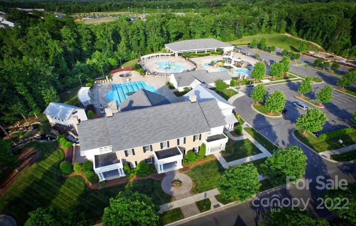 4043 Oakmere Road, Unit 953 Waxhaw, NC 28173 - Photo 15 of 21 an aerial view of a house with garden space and street view