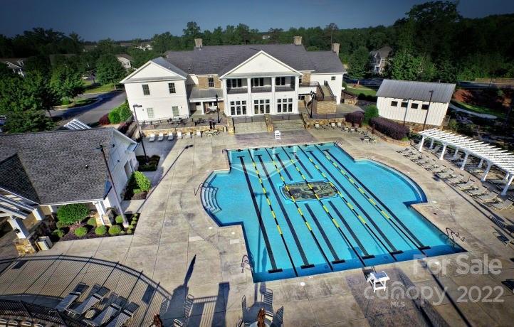 4043 Oakmere Road, Unit 953 Waxhaw, NC 28173 - Photo 20 of 21 a view of a house with patio outdoor seating