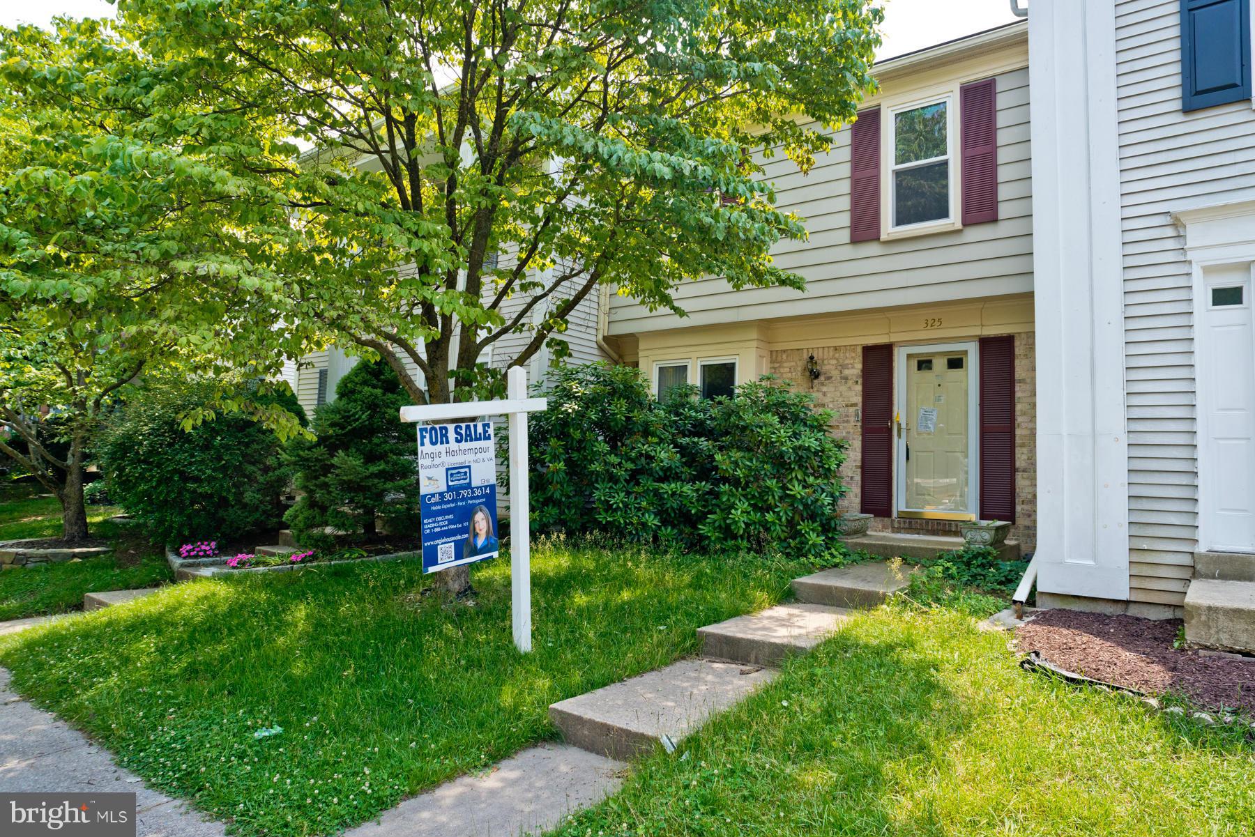 325 Crescendo Way Silver Spring, MD 20901 - Photo 2 of 21 a view of a house with backyard and a tree