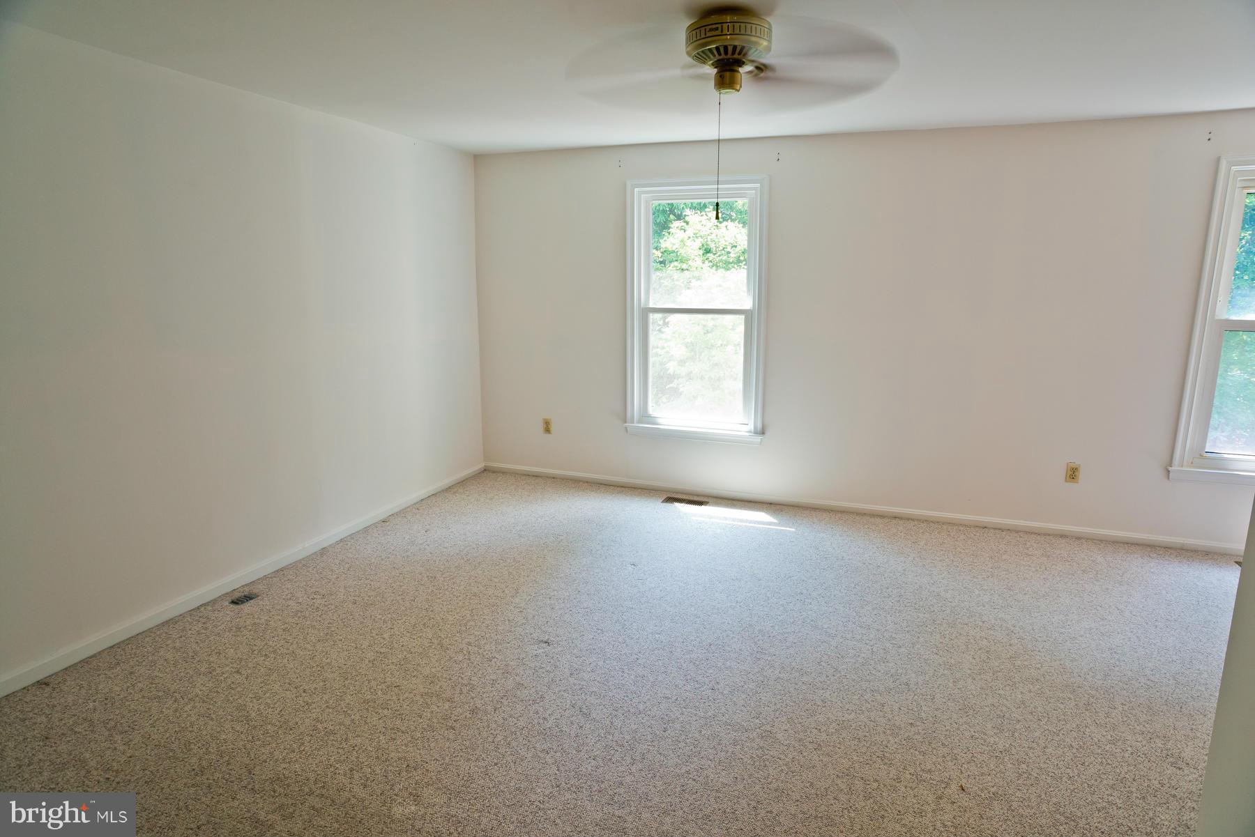 325 Crescendo Way Silver Spring, MD 20901 - Photo 17 of 21 an empty room with a window