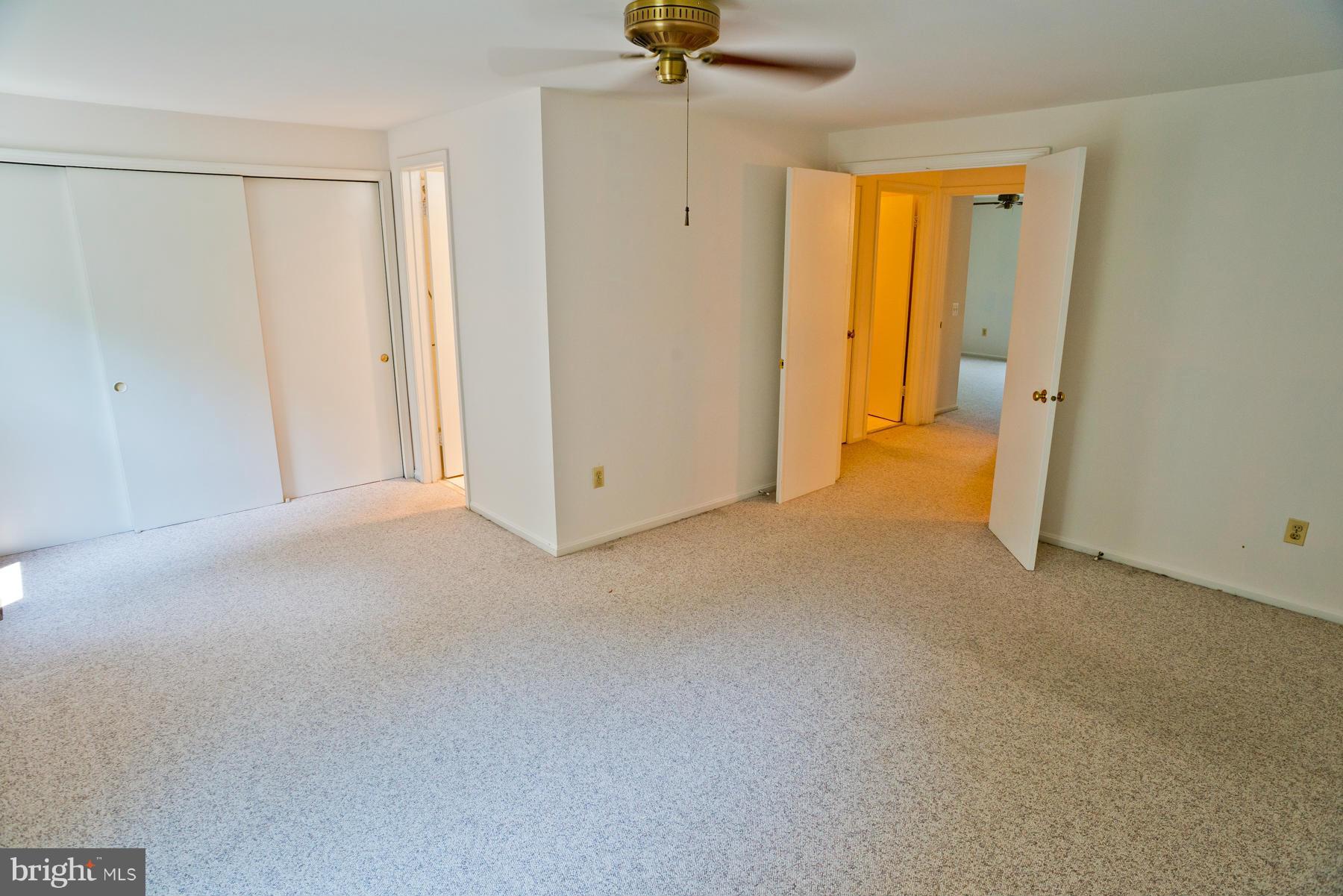 325 Crescendo Way Silver Spring, MD 20901 - Photo 18 of 21 a view of a room with a walk in closet