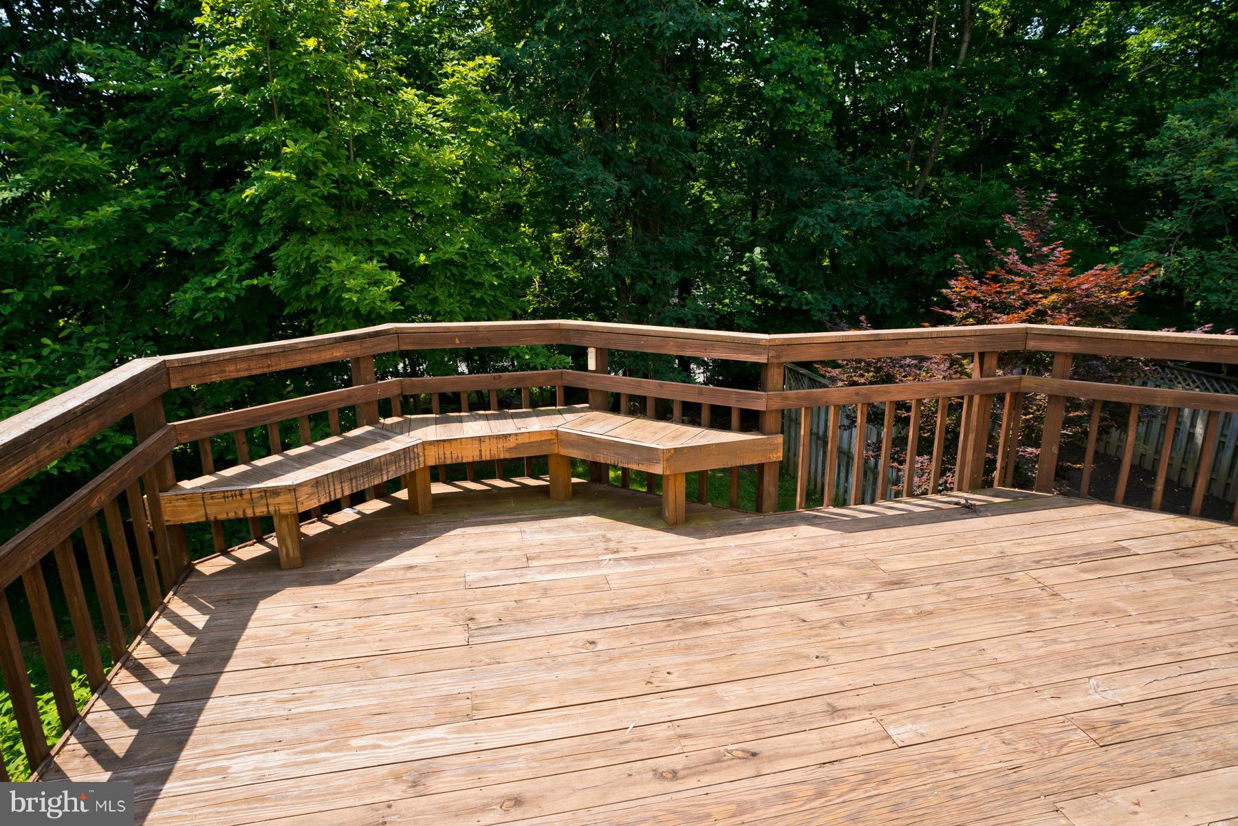 325 Crescendo Way Silver Spring, MD 20901 - Photo 4 of 21 a view of balcony with wooden floor and fence
