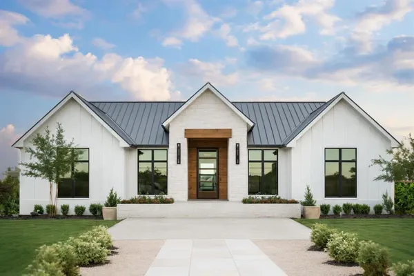 front view of a house with a yard