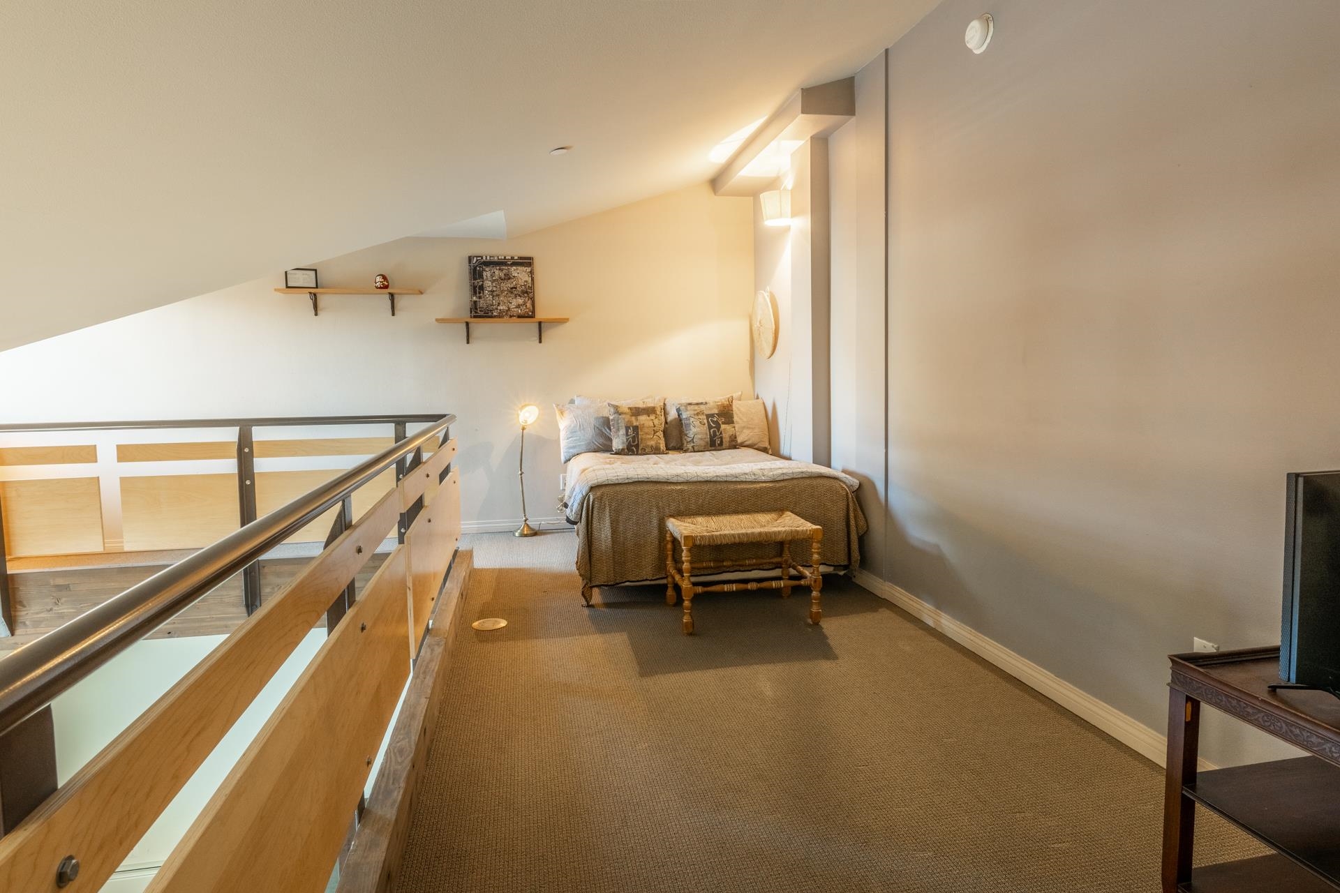 436 Old Mammoth Road, Unit 1 Mammoth Lakes, CA 93546 - Photo 12 of 23 a bedroom with furniture and a window