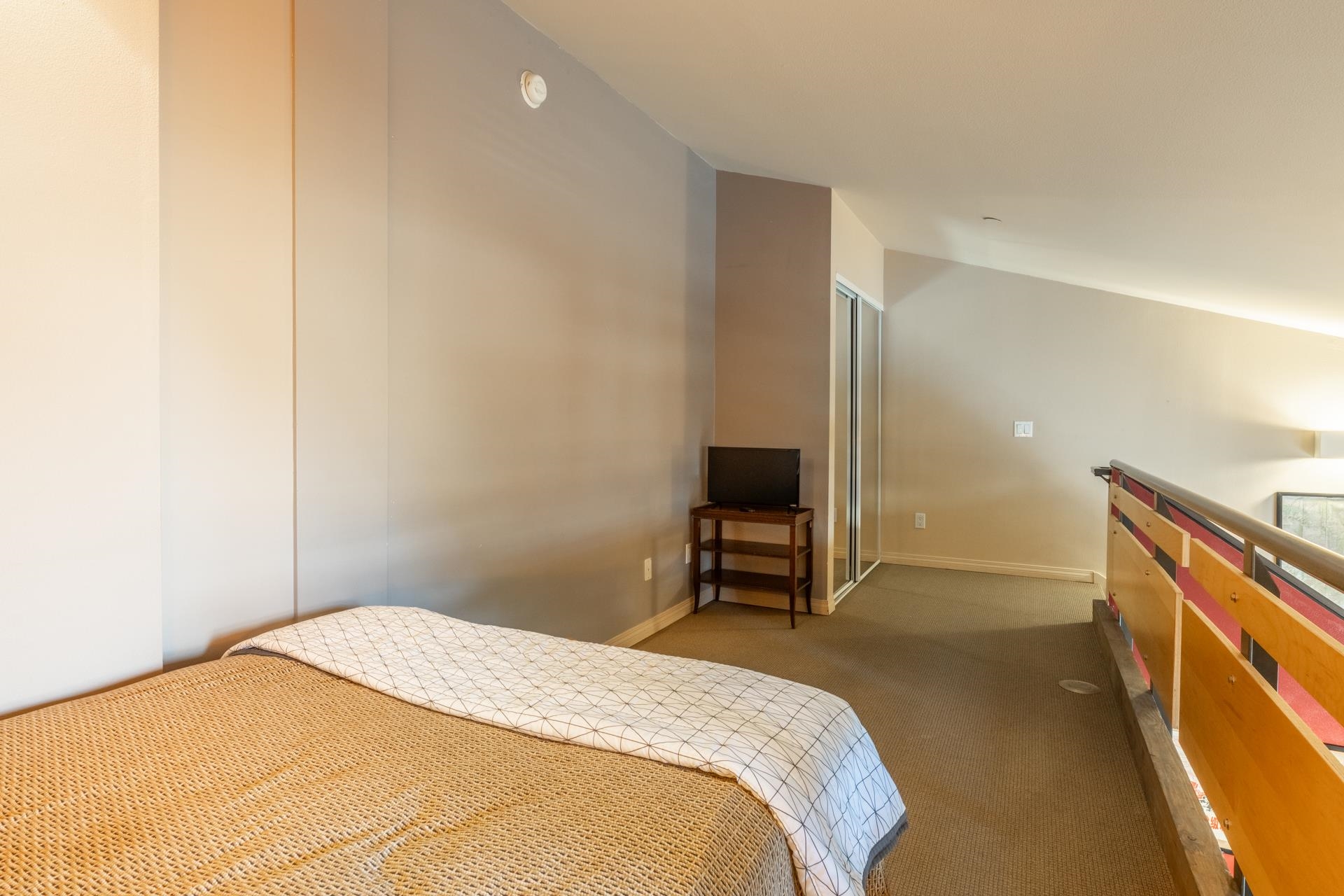 436 Old Mammoth Road, Unit 1 Mammoth Lakes, CA 93546 - Photo 14 of 23 a bedroom with a bed and a television