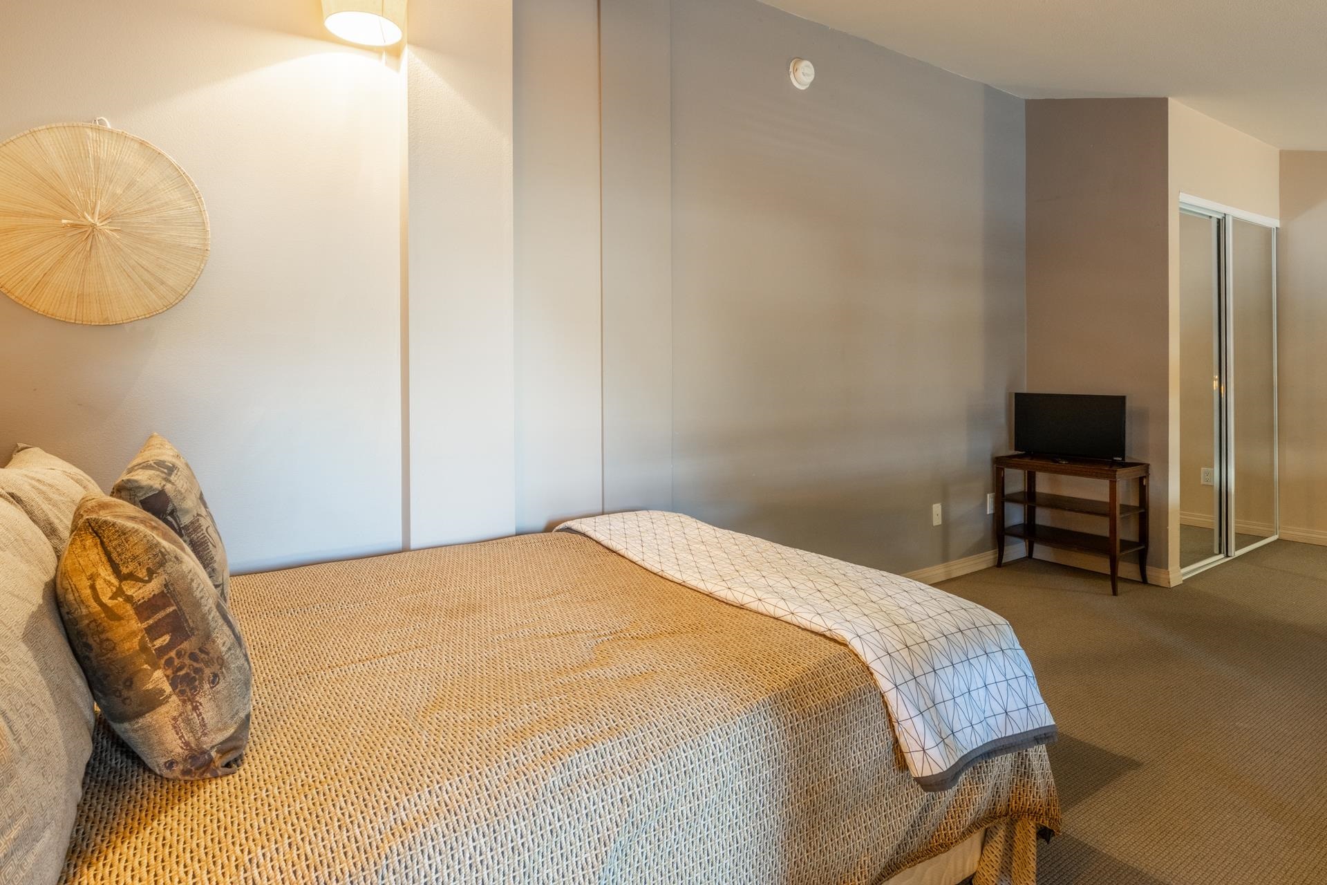 436 Old Mammoth Road, Unit 1 Mammoth Lakes, CA 93546 - Photo 17 of 23 a bedroom with a bed and a chair