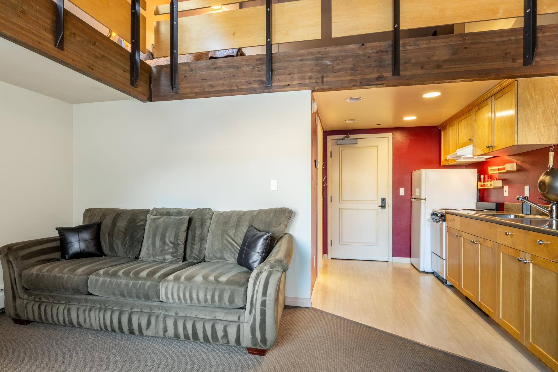 436 Old Mammoth Road, Unit 1 Mammoth Lakes, CA 93546 - Photo 9 of 23 a living room with furniture and a kitchen