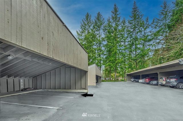 a view of a street with brick building in front of it