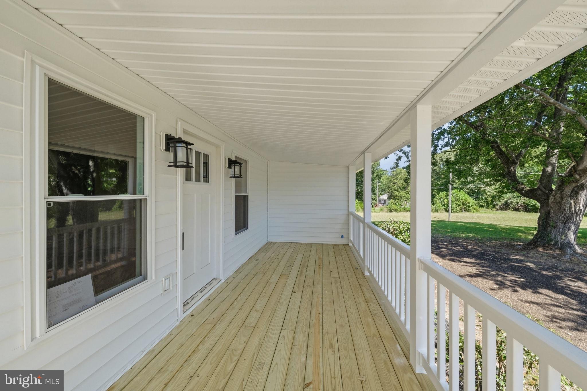 2010 River Road, Unit NORTHERN Lancaster, VA 22503 - Photo 35 of 87 Generous Front Porch to enjoy sunrises