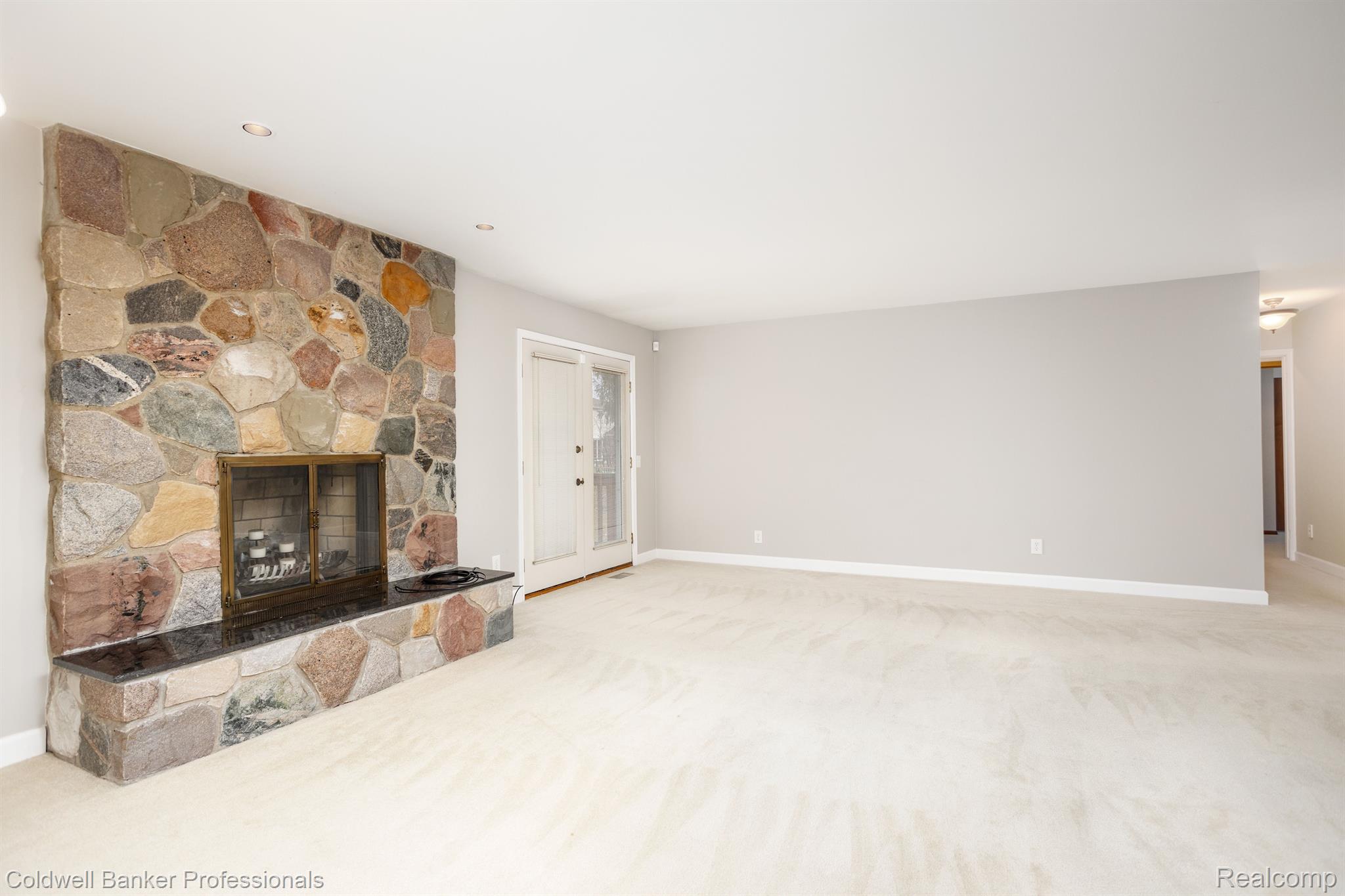 8571 Mannington Road Canton, MI 48187 - Photo 11 of 37 Great Room with Fieldstone fireplace
