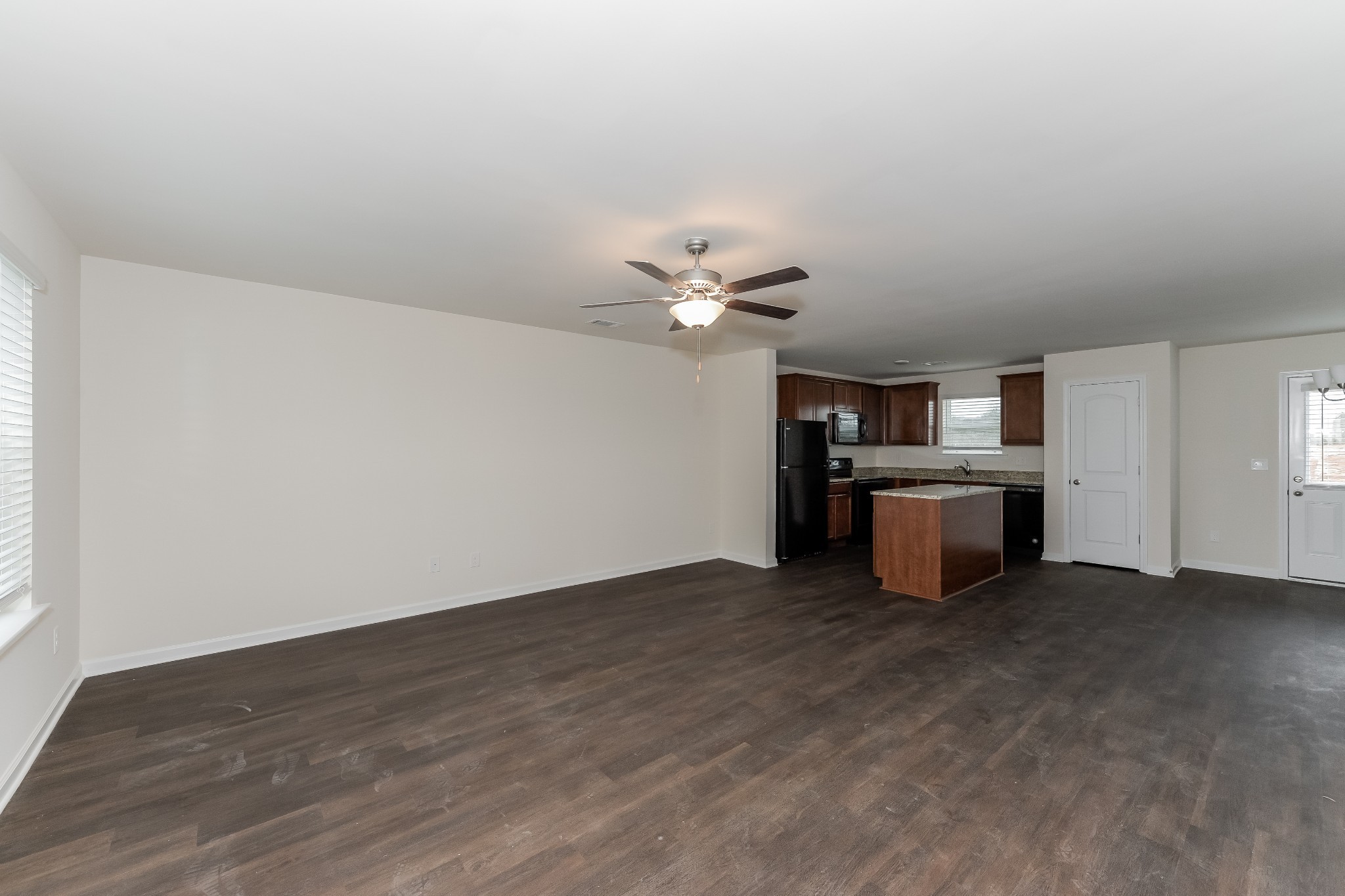 2714 Swarm Court Columbia, TN 38401 - Photo 2 of 17 a view of a kitchen with a sink cabinets and wooden floor