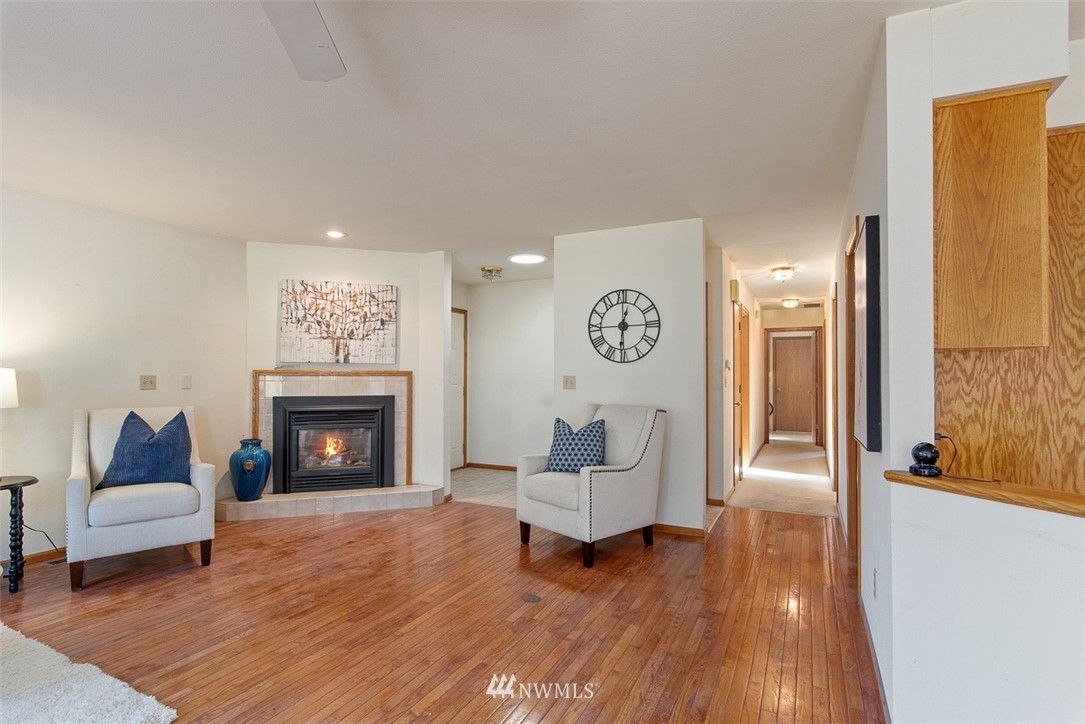 6852A Raspberry Dr., Unit B Everson, WA 98247 - Photo 12 of 25 a living room with furniture and a fireplace