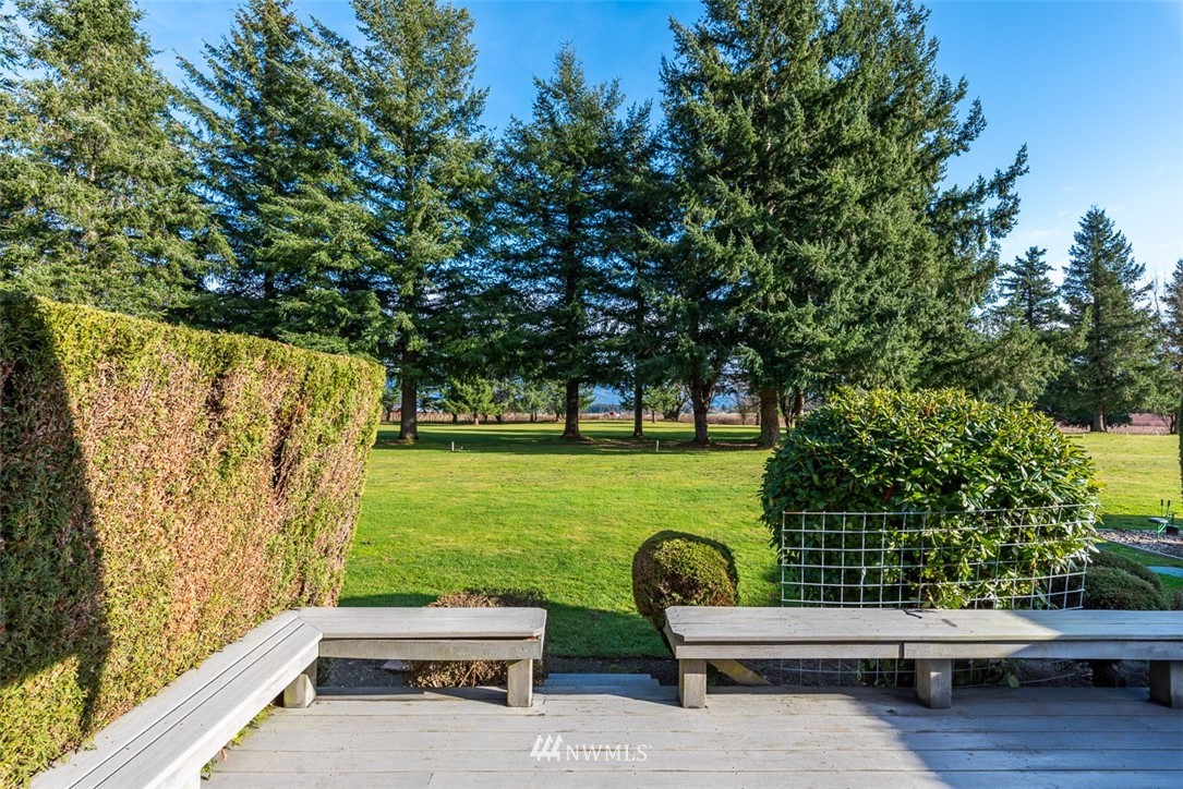 6852A Raspberry Dr., Unit B Everson, WA 98247 - Photo 23 of 25 a view of a bench in the garden