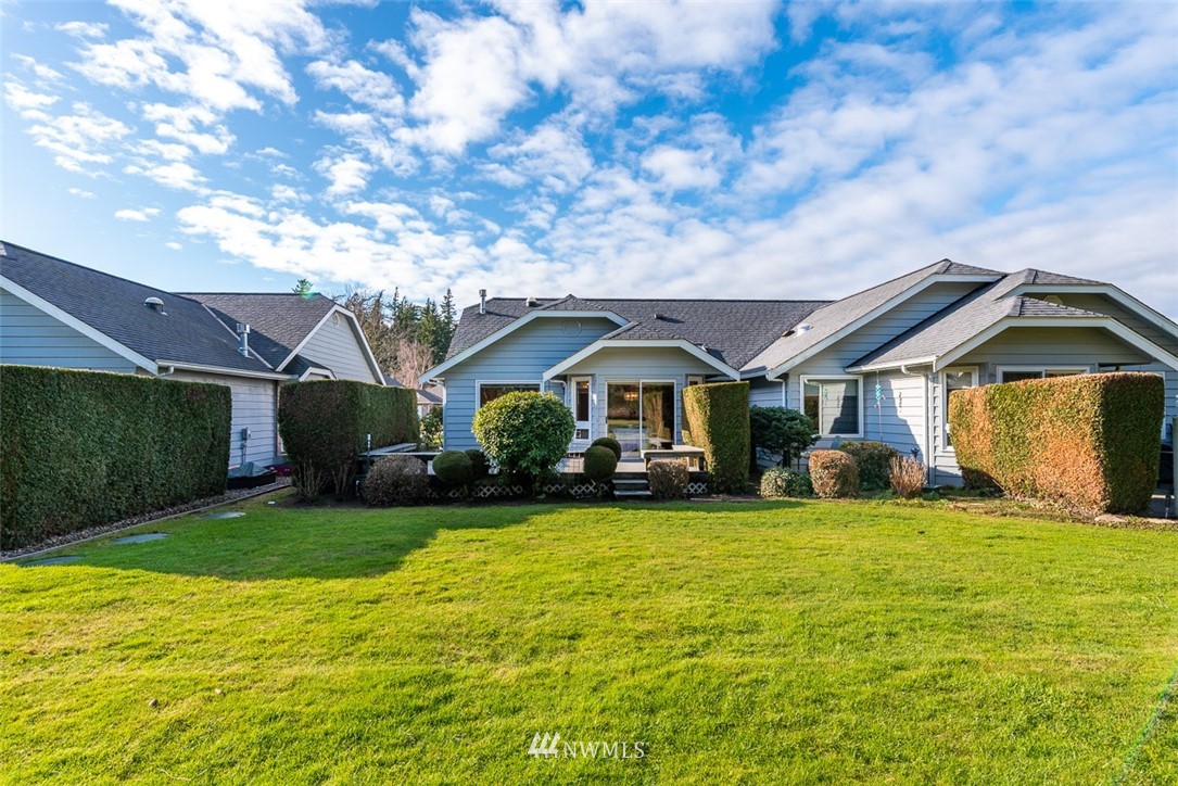 6852A Raspberry Dr., Unit B Everson, WA 98247 - Photo 25 of 25 a view of a house with yard and porch