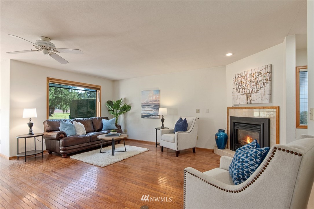 6852A Raspberry Dr., Unit B Everson, WA 98247 - Photo 4 of 25 a living room with furniture and a fireplace