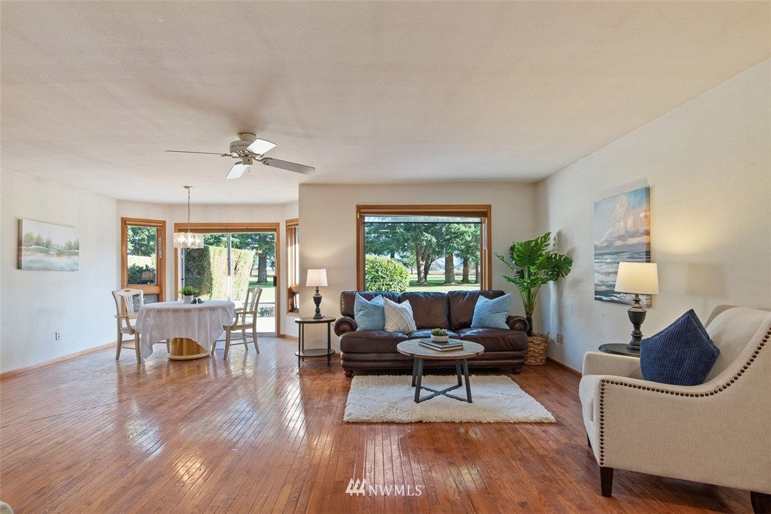 6852A Raspberry Dr., Unit B Everson, WA 98247 - Photo 5 of 25 a living room with furniture and a wooden floor