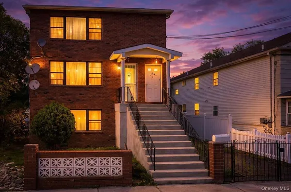 a front view of a house with a porch