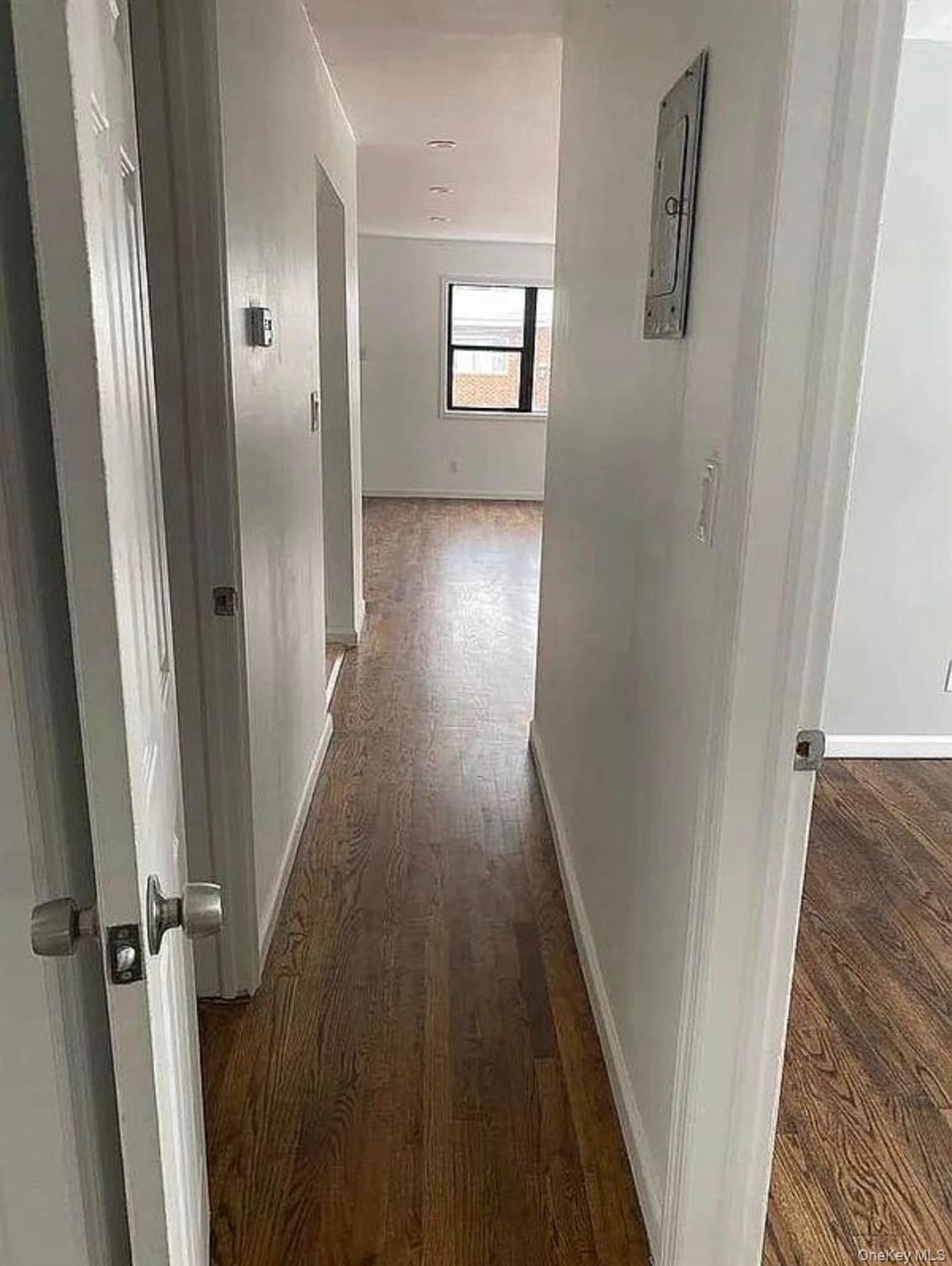 235-15 Bentley Road Queens, NY 11422 - Photo 12 of 17 wooden floor in a gallery