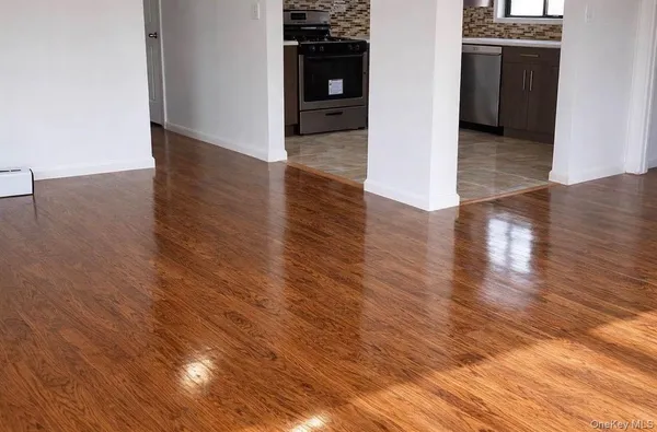 a kitchen with stainless steel appliances granite countertop a refrigerator sink and cabinets