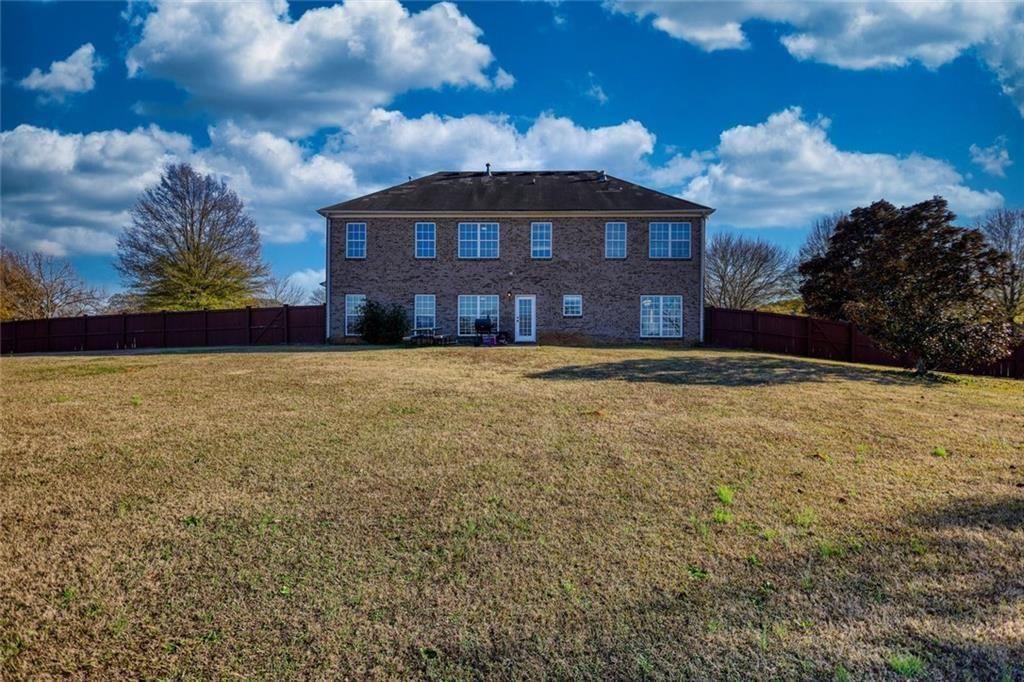 25 Caseys Way Covington, GA 30014 - Photo 30 of 33 a view of a house with a yard