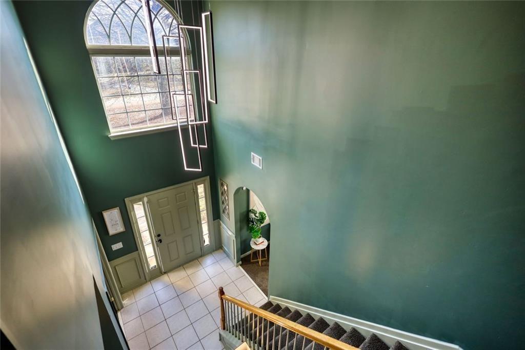 25 Caseys Way Covington, GA 30014 - Photo 7 of 33 an entryway with a mirror