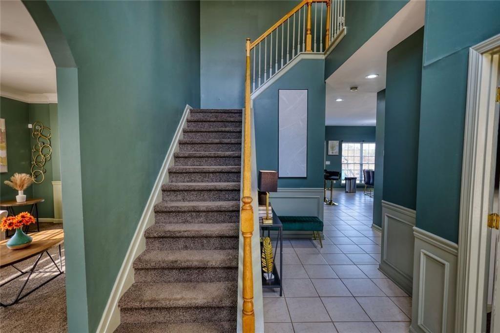 25 Caseys Way Covington, GA 30014 - Photo 8 of 33 a view of entryway and hall with wooden floor