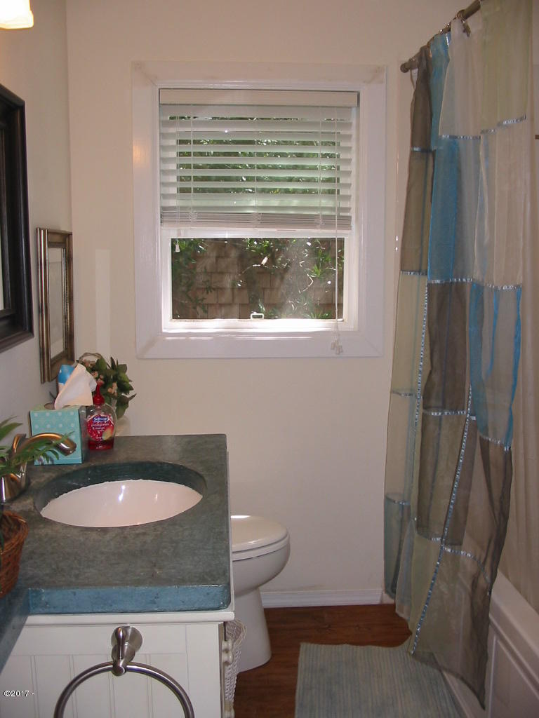 47840 Hawk Street Neskowin, OR 97149 - Photo 11 of 20 Guest Bathroom with concrete counter top