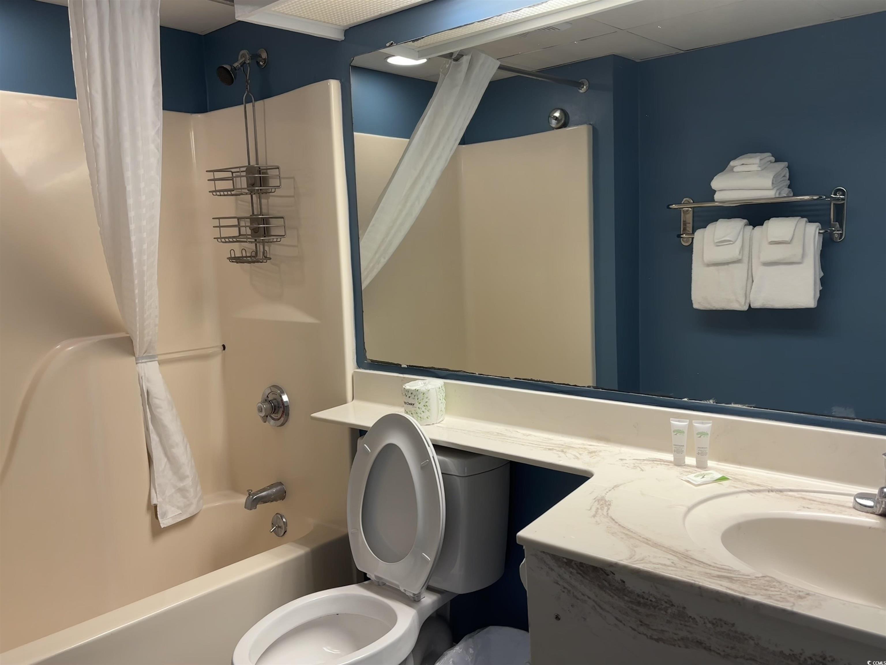 201N 74th Avenue North, Unit 2845/46 Myrtle Beach, SC 29572 - Photo 9 of 9 Full bathroom with shower / tub combo with curtain and vanity