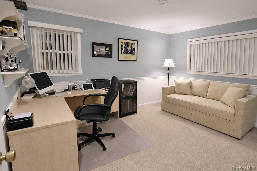 3421 Turf Road Oceanside, NY 11572 - Photo 40 of 50 a view of a livingroom with workspace and a couch