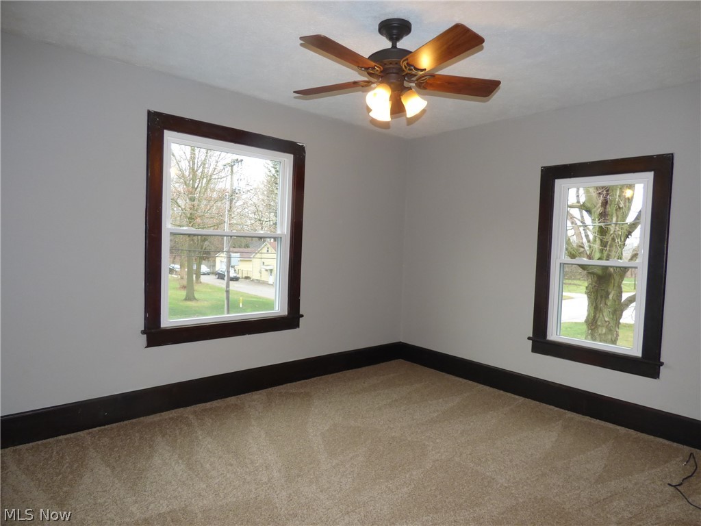 6574 Ridge Road Wadsworth, OH 44281 - Photo 21 of 35 2nd bedroom upstairs with fresh paint & new carpet!